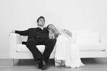 Just married couple relaxing on sofa
